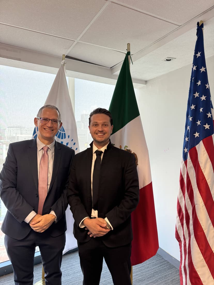 Robert Katona at COMCE with Mexico and US flags