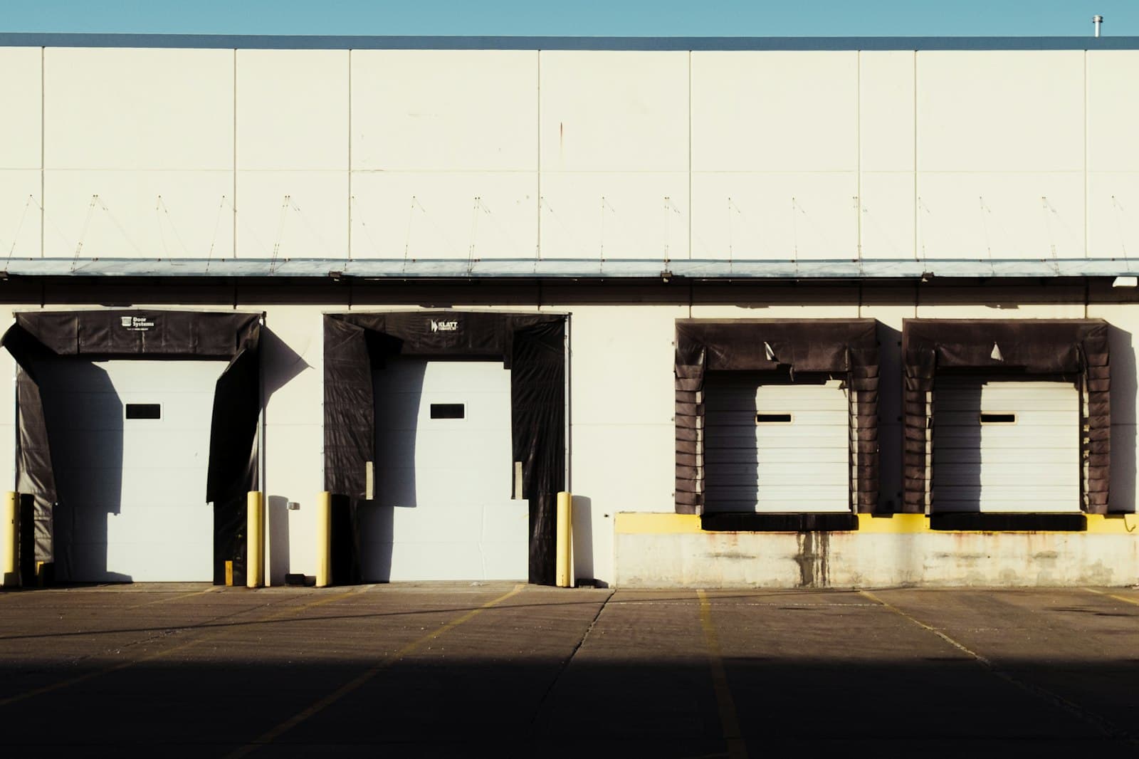 Loading docks along a modern warehouse where a foreign-owned manufacturing operation in Mexico ships its exports